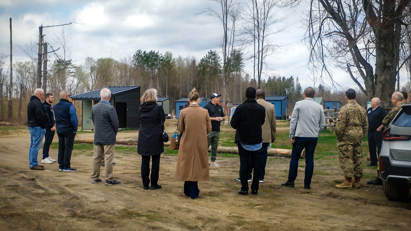 Aaron walking a delegation through Hammond Hill